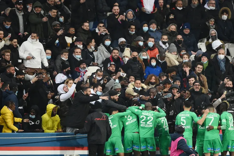 Saint-Etienne players celebrate the goal with their fans