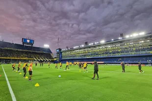 Boca Juniors and Always Ready do warm-up exercises before the match for the Copa Libertadores