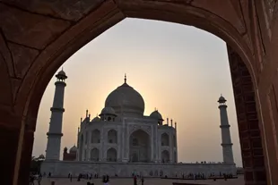 People visit the Taj Mahal in Agra on May 19, 2022.